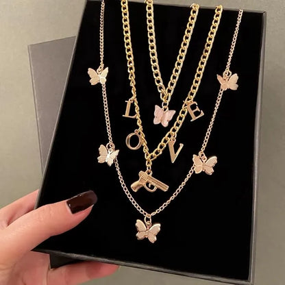 Layered Stylish Gold Plated Gun Butterfly Love Pendants Necklace Chains Destiny Jewels