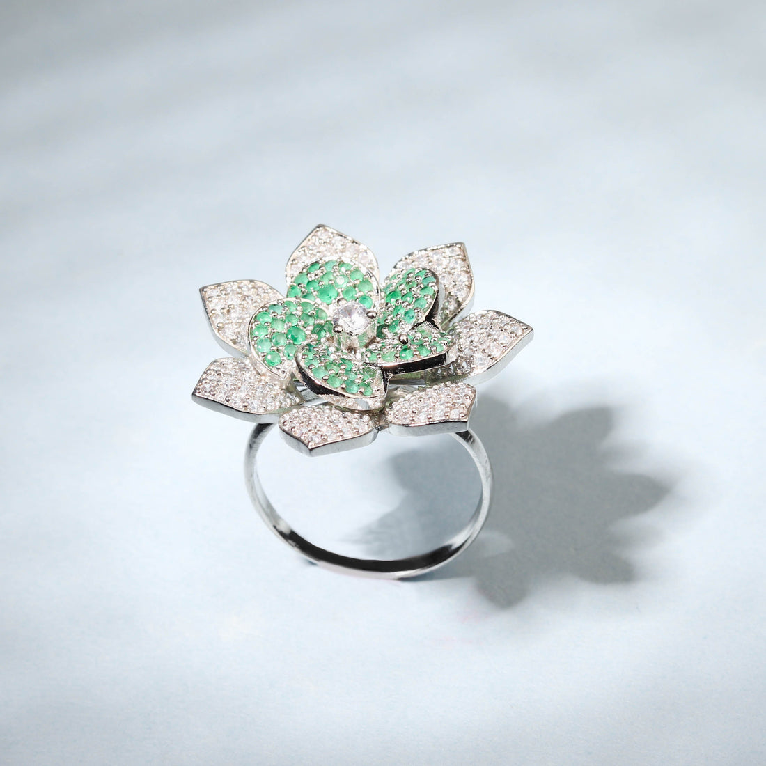 Elegant Flower Shaped Finger Ring With Green Stones For Women - Free Size