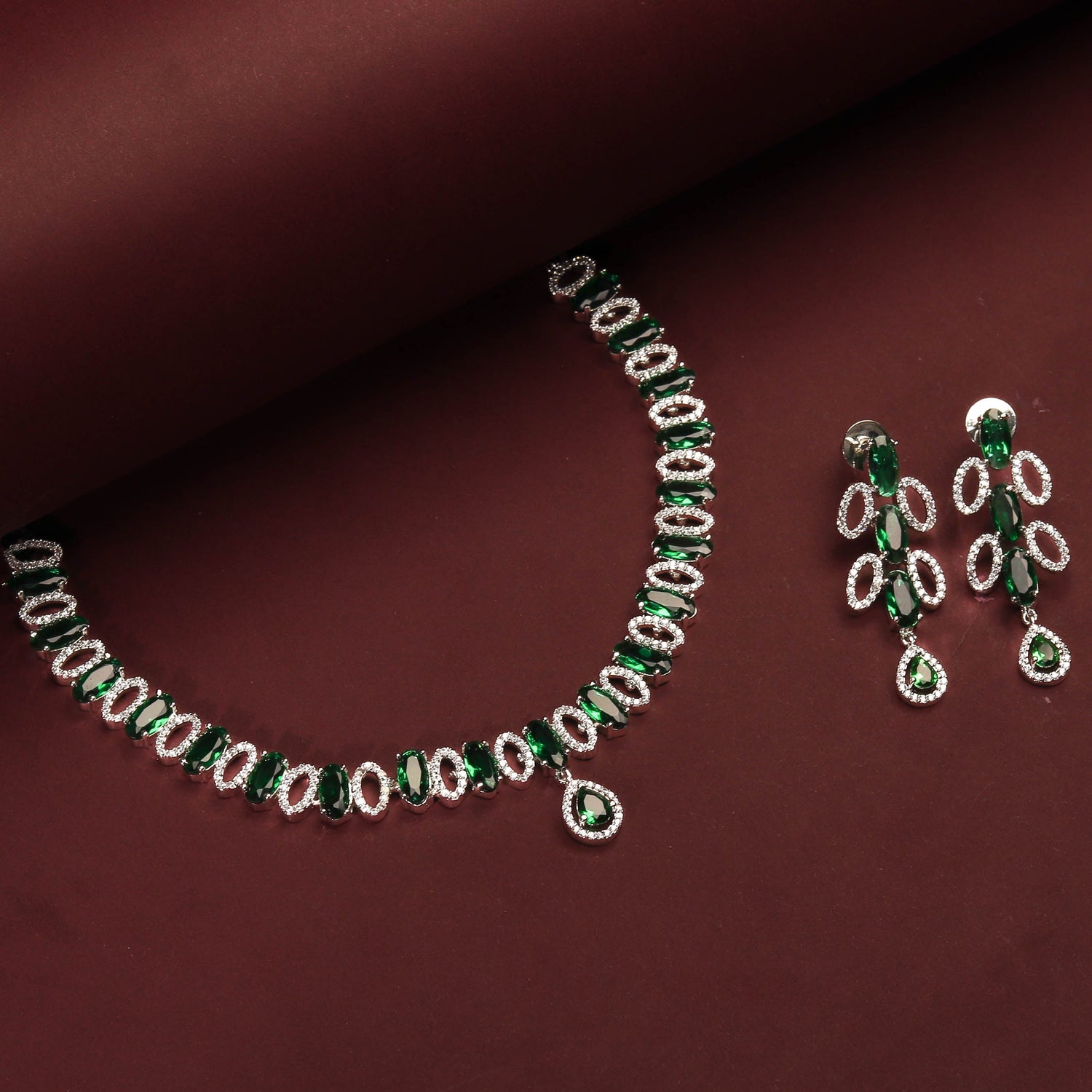 Rhodium Plated Elegant Necklace Set With Emerald Green Stones And Pair Of Earrings