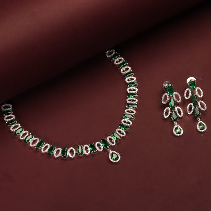 Rhodium Plated Elegant Necklace Set With Emerald Green Stones And Pair Of Earrings