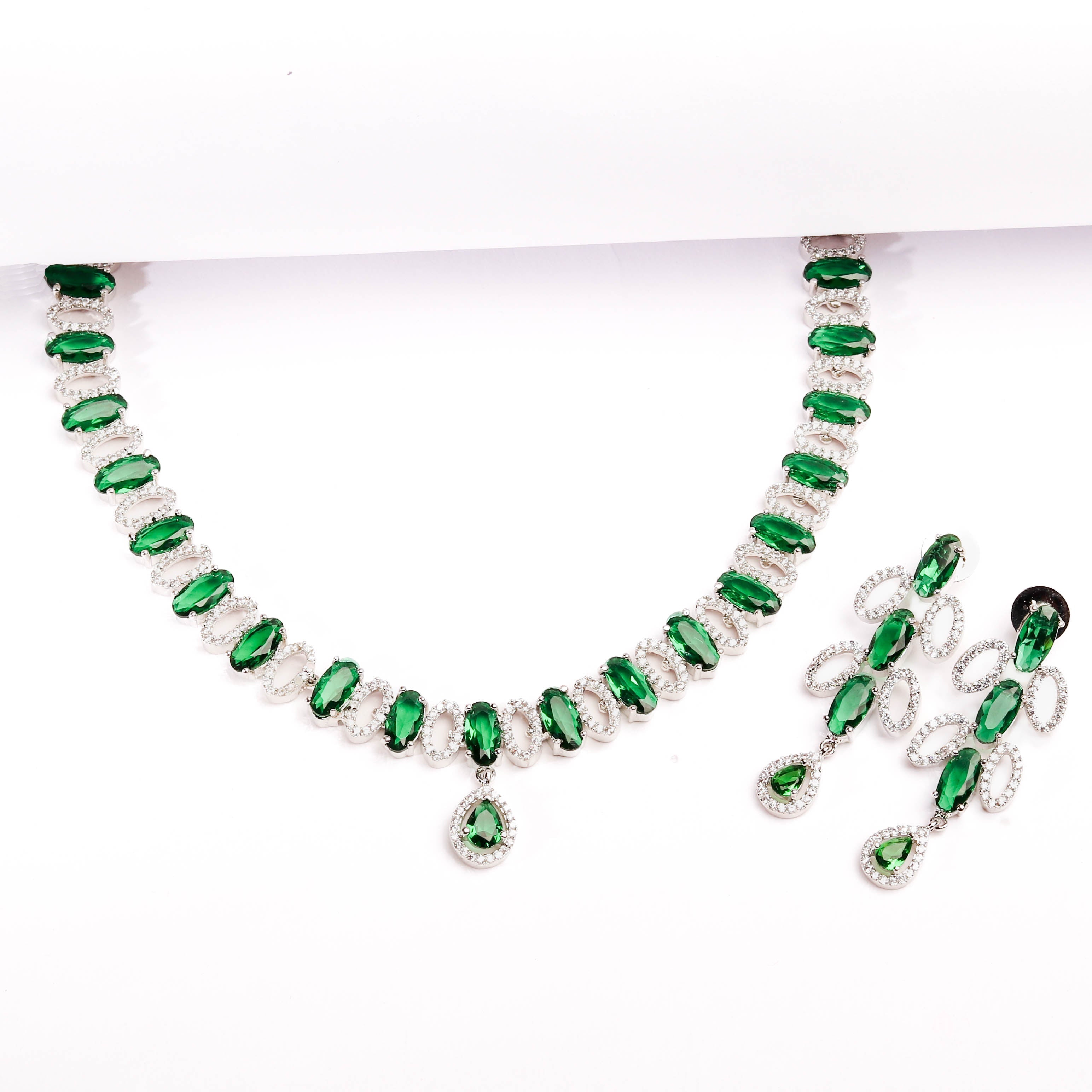 Rhodium Plated Elegant Necklace Set With Emerald Green Stones And Pair Of Earrings