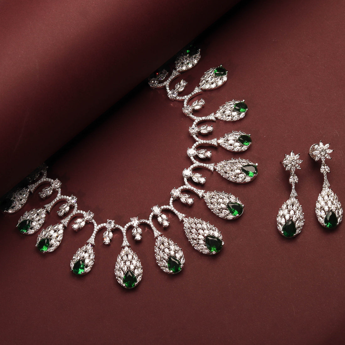 Rhodium Plated Elegant Nature Inspired Necklace Set With Ruby Color Emerald Green Stones And Earrings