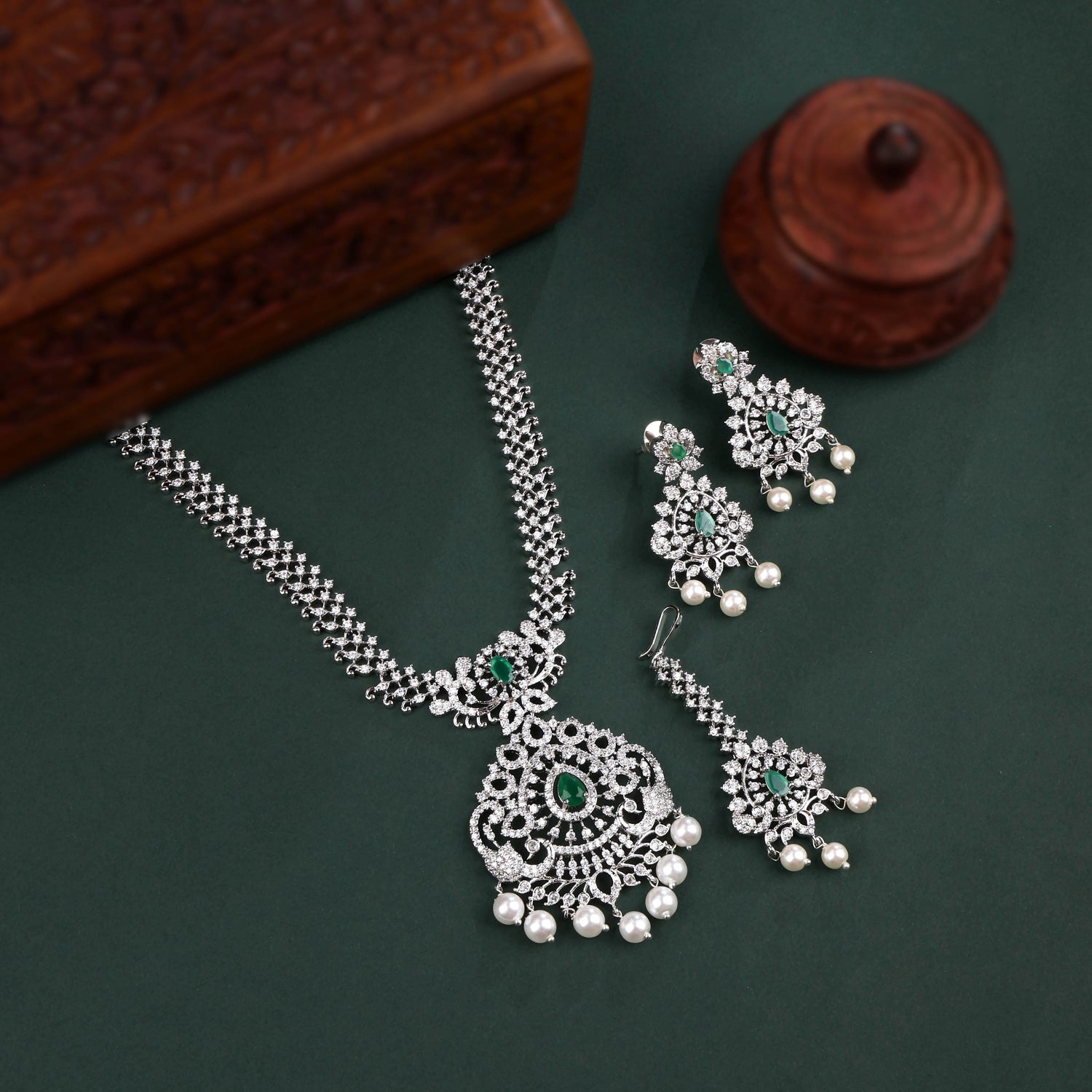 Rhodium Plated Necklace Set With Green Color Stones And Pearl Drops Style Work And Maang tikka