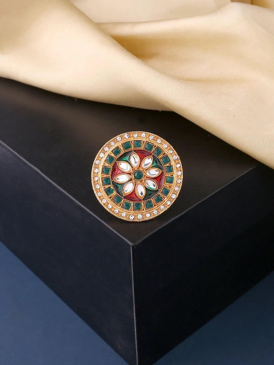 Gold plated red and green Kundan stone studded minakari adjustable finger ring.