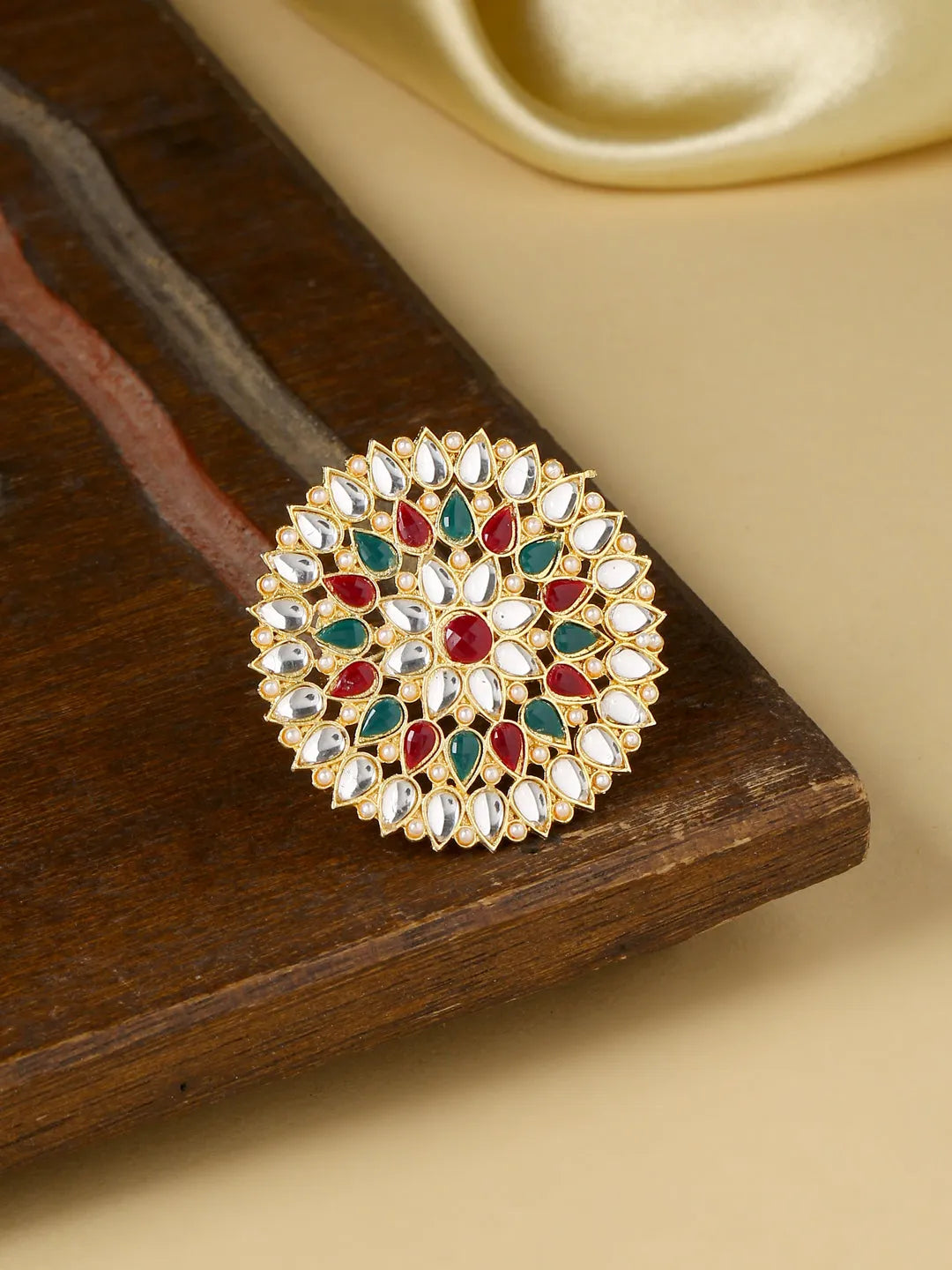 Gold plated red and green Kundan stone studded minakari adjustable finger ring.