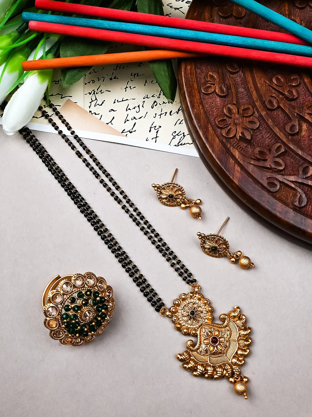 Gold Rajwadi Mangalsutra With Long Double Line Black Beads Mala and Green Polki Ring