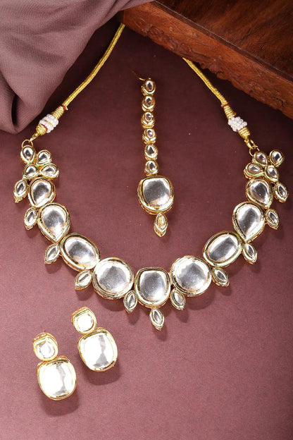 Gold Kundan-Studded Necklace and Earrings with Mang Tikka