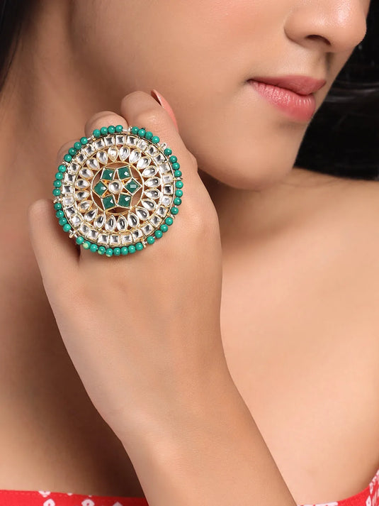 Gold plated red and green kundan stone studed meenakari adjustable finger ring.