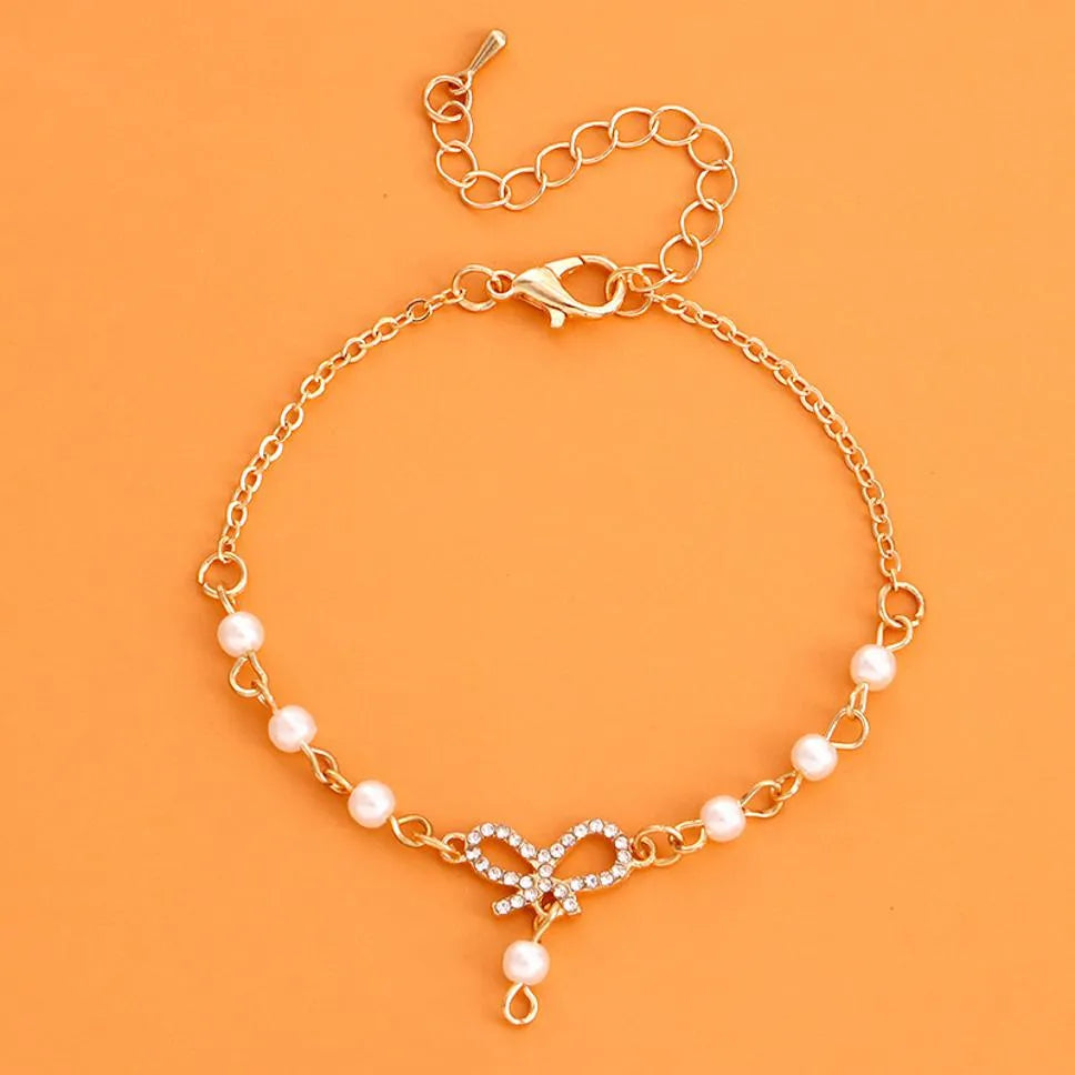 Modern Bow Design With Pearl Bracelet - Set Of 1 Destiny Jewels